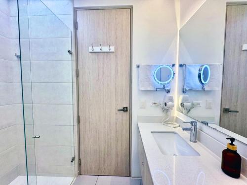 Et badeværelse på Suite Vista a Reserva y Mar piso15 Bello Horizonte