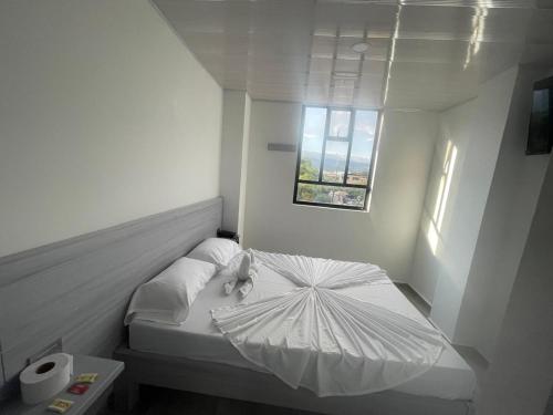 Postel nebo postele na pokoji v ubytování Hoteltokiio