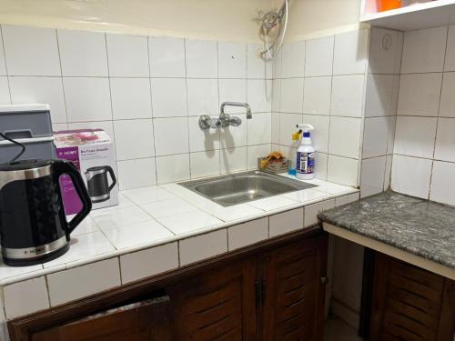 Η κουζίνα ή μικρή κουζίνα στο Malika studio