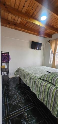 TV a/nebo společenská místnost v ubytování Casa familiar grande El Quisco parrilla y estacionamiento