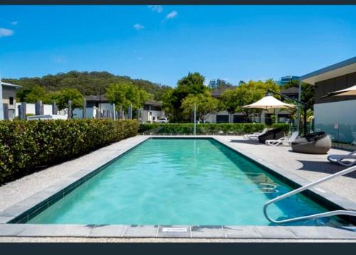 Swimmingpoolen hos eller tæt på Ash's Place