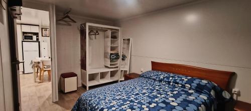 En eller flere senge i et værelse på Casita sostenible