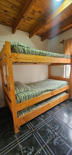 Postel nebo postele na pokoji v ubytování Cabaña pet friendly el quisco