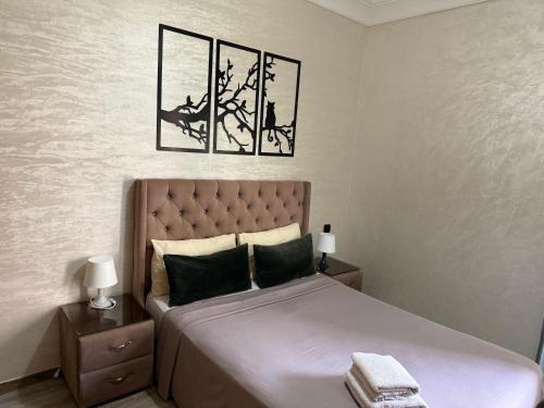 En eller flere senge i et værelse på Studio Stade Morocco