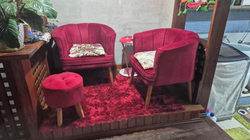 Ein Sitzbereich in der Unterkunft Casa completa a 10min da praia de BC