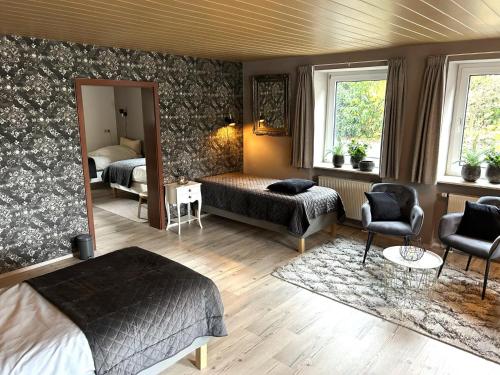 En eller flere senge i et værelse på Grutsk