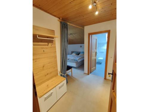 En eller flere senge i et værelse på Holiday apartment Sonnenberg