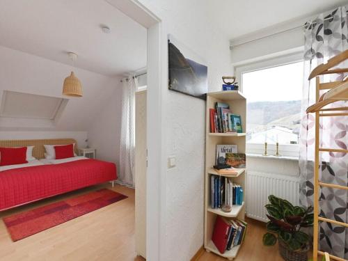 En eller flere senge i et værelse på Villa Näkel-Sonnenberg