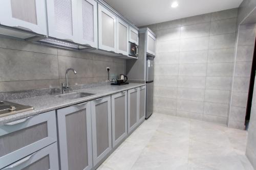 Køkken eller tekøkken på حياة ريزيدنس ابها