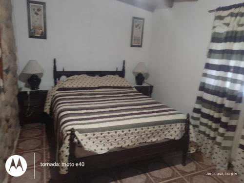 En eller flere senge i et værelse på El Descanso