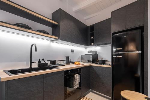 Kuchyň nebo kuchyňský kout v ubytování stema suite 2