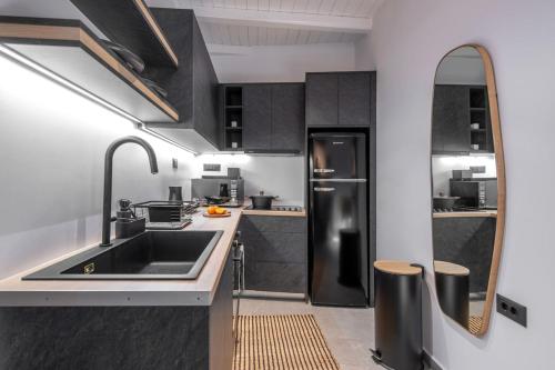 Kuchyň nebo kuchyňský kout v ubytování stema suite 2