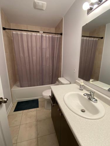 Koupelna v ubytování Cozy Prime Home