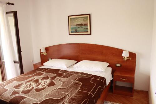 Apartments and rooms with parking space Palit, Rab - 5067