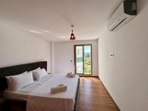 Postel nebo postele na pokoji v ubytování Prestigia Luxury Apartments Fes