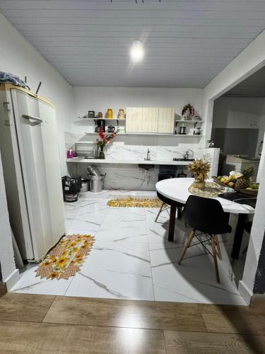 Kuchyň nebo kuchyňský kout v ubytování Casa Aconchego da Vó Gera