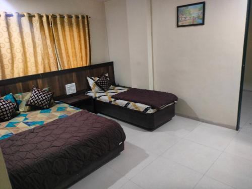 Afbeelding uit fotogalerij van Hotel Shri Sai Ashwariya inn in Shirdi