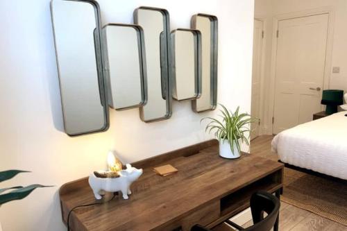 Postel nebo postele na pokoji v ubytování Modern apartment in Tetbury Town Centre