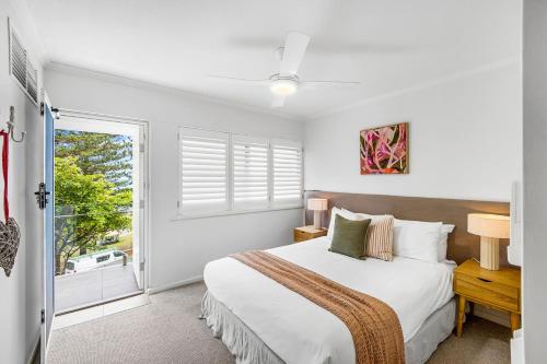 En eller flere senge i et værelse på Salt Luxury Location