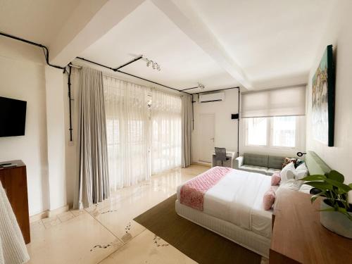 Postel nebo postele na pokoji v ubytování Kresna By The Sea By Kresna Hospitality