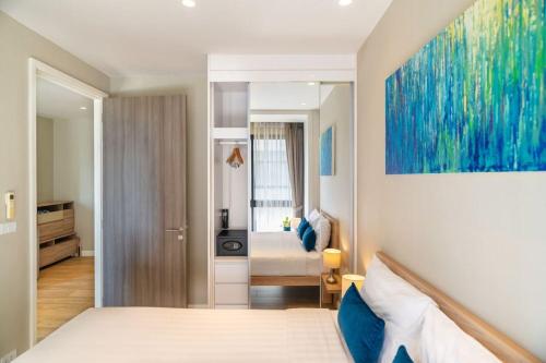En eller flere senge i et værelse på 2 BR Apt in Diamond Resort Phuket - B510