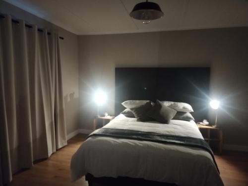 Postel nebo postele na pokoji v ubytování 40 on Caledon