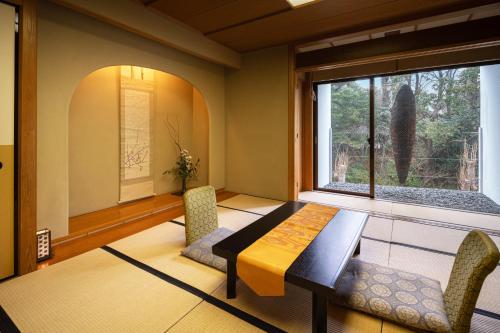 Χώρος καθιστικού στο Chigusa Hotel