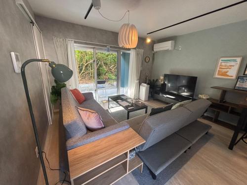 Et tv og/eller underholdning på Plus Life Shiraho A号室