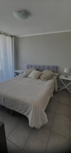 En eller flere senge i et værelse på II Cerca de la playa y del centro