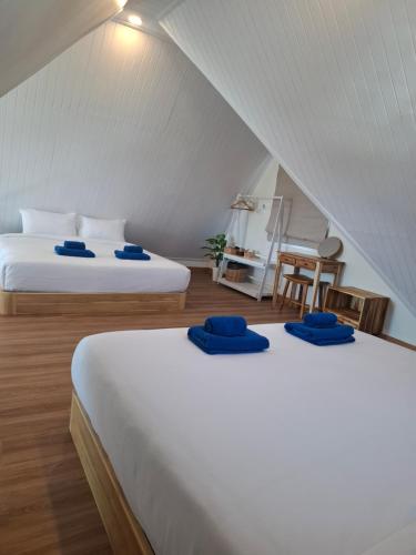 En eller flere senge i et værelse på 373 so cute poolvilla