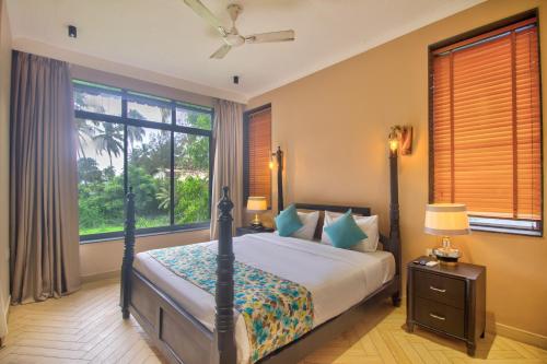 En eller flere senge i et værelse på Aruba Luxury Resort By AADI Hospitality