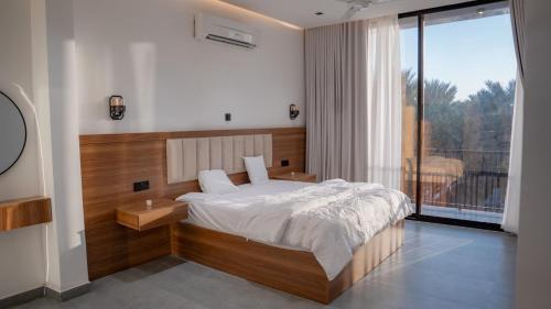 Postel nebo postele na pokoji v ubytování oasis of shade