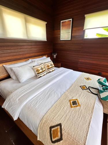 Postel nebo postele na pokoji v ubytování Umah Dedari