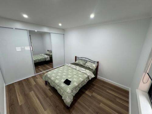 Ein Bett oder Betten in einem Zimmer der Unterkunft HOME away from HOME