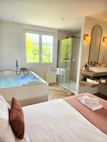 En eller flere senge i et værelse på Le Boudoir d'Elba - Balneotherapie & terrasse