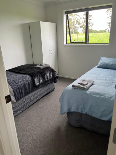 Postel nebo postele na pokoji v ubytování Rural Guest Studio