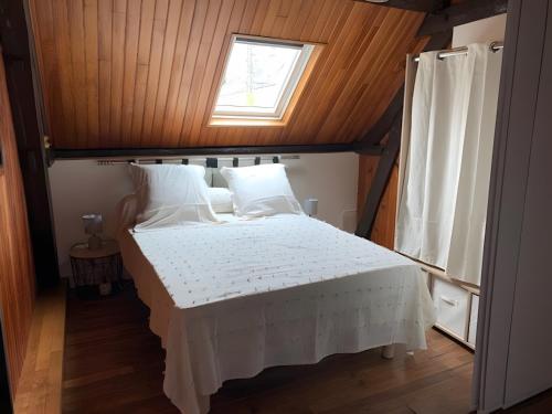 En eller flere senge i et værelse på Le Relax 41