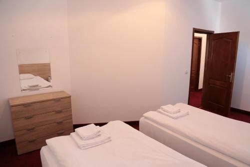 Postel nebo postele na pokoji v ubytování Hotel Apollonia