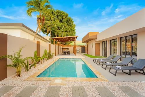 Ảnh trong thư viện ảnh của Aruba Escape Spacious 5BR Villa for 12 by Bocobay ở Oranjestad