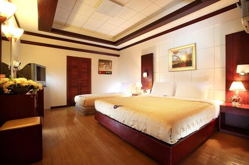 Ліжко або ліжка в номері Incheon Airporthotel Airstay