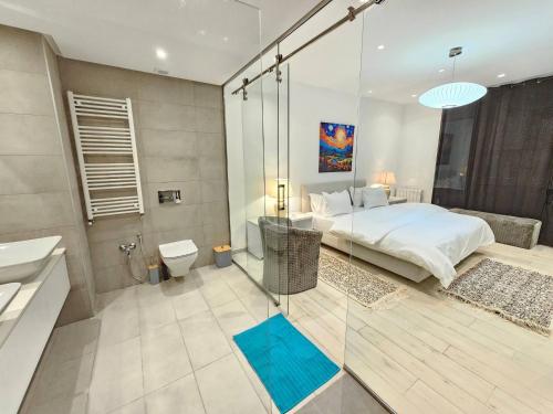 Ένα μπάνιο στο Refined villa in the heart of La Marsa with garden