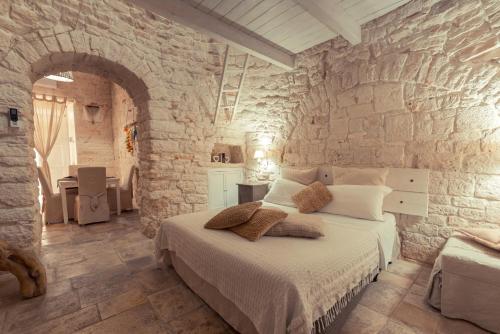 Postel nebo postele na pokoji v ubytování Resort La Corte Dell'Astore - Wild in Style Resort