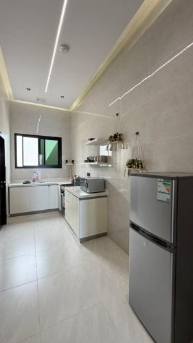 Kuchyň nebo kuchyňský kout v ubytování استراحة أُنس