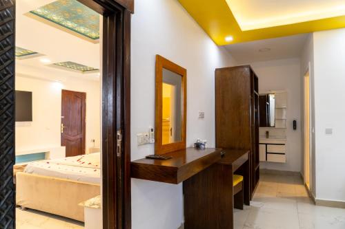 Ένα ή περισσότερα κρεβάτια σε δωμάτιο στο Golden Hotel