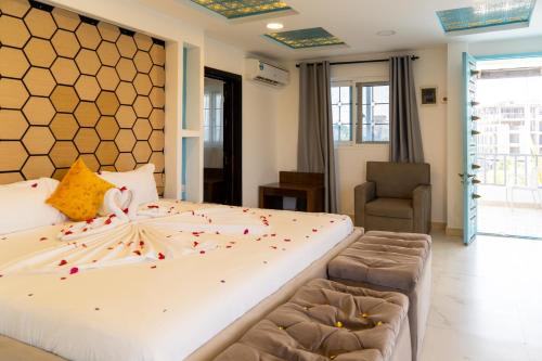 Ένα ή περισσότερα κρεβάτια σε δωμάτιο στο Golden Hotel