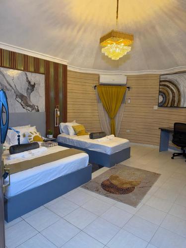 Postel nebo postele na pokoji v ubytování Chic Premium Hotel