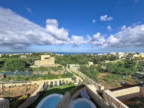 an aerial view of the ruins of a castle at Peaceful Home with Private Pool and Rooftop Jacuzzi in Xagħra