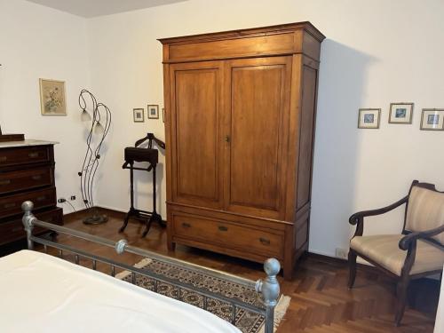 En eller flere senge i et værelse på Villa ELISA - appartamento nel cuore del Chianti