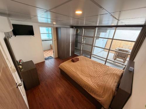 Кровать или кровати в номере Moonlight Samui hotel and bar