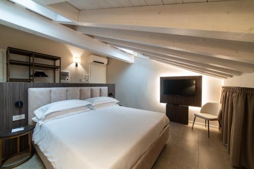 En eller flere senge i et værelse på Modena Relax Luxury Rent Rooms